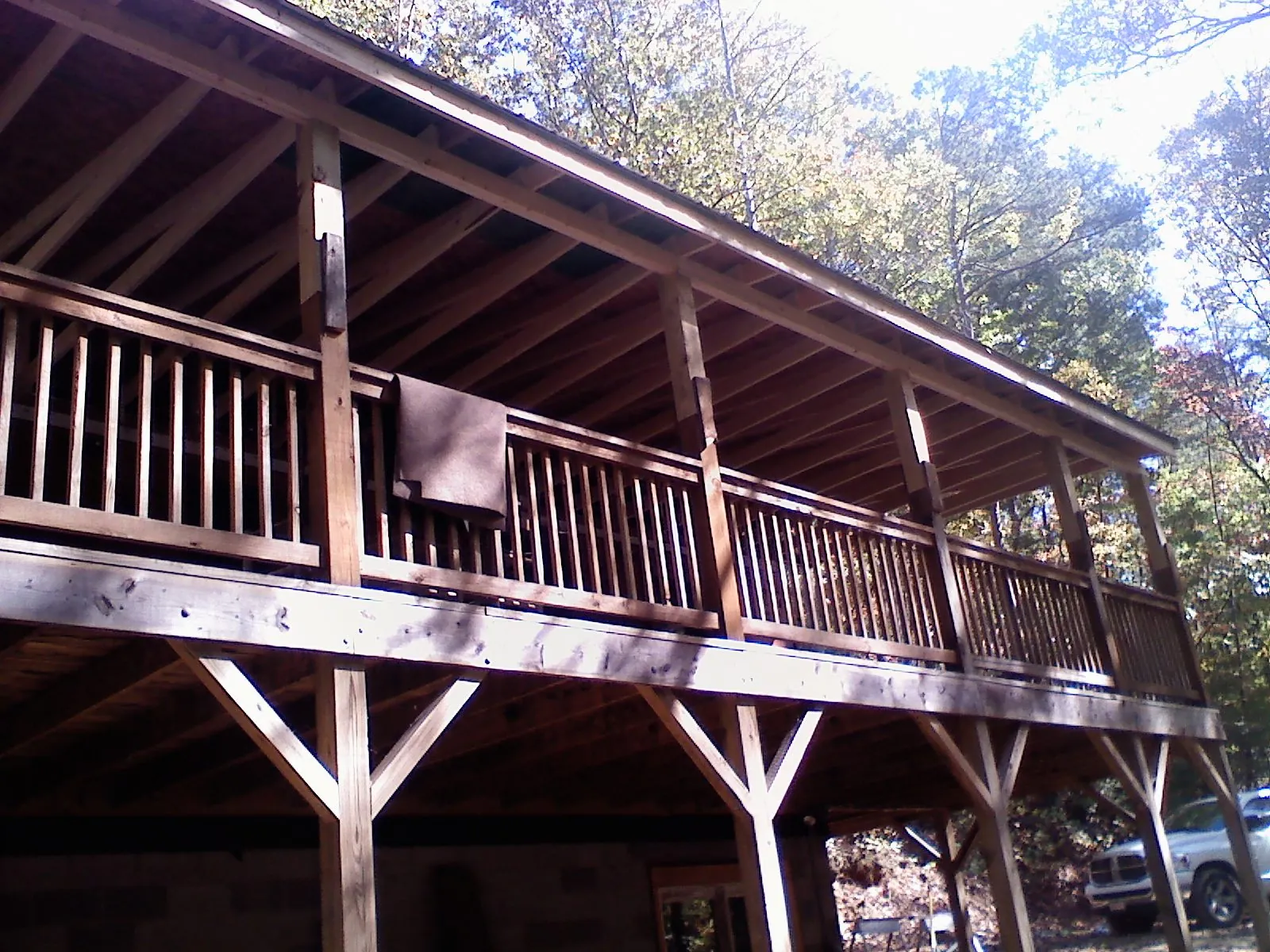 Timber framing under a new elevated porch and deck — Roof Leak Repair in Mount Carroll by Roofing Brothers